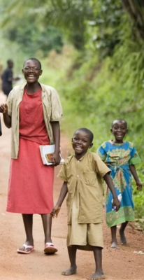 People in Africa that are happy and holding a book